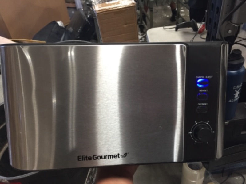 Photo 2 of 
Elite Platinum ECT-3100 Cool Touch Long Slot Toaster with Extra Wide 1.25" Slots for Bagels, 6 Settings, Space Saving Design, Warming Rack, 4 Slice, Stainless Steel & Black

//MINOR DAMAGE TO SIDE WITH DENT 
