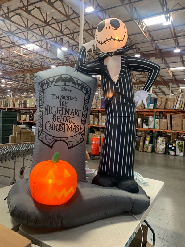 Photo 2 of 6 ft. LED Jack Skellington with Tombstone Airblown Disney Halloween Inflatable