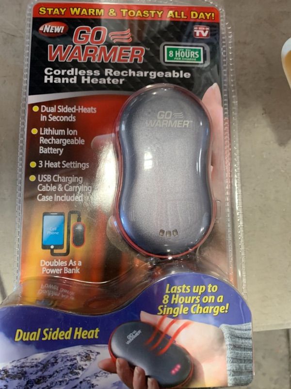 Photo 2 of 17.06 BTUs Electric Rechargeable Personal Hand Heater
AS IS 2PKS