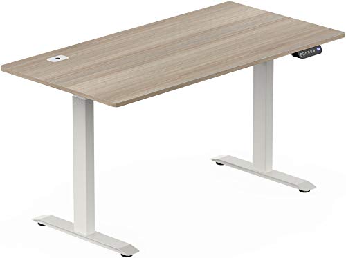 Photo 1 of SHW 55-Inch Large Electric Height Adjustable Standing Desk, 55 X 28 Inches, Oak
