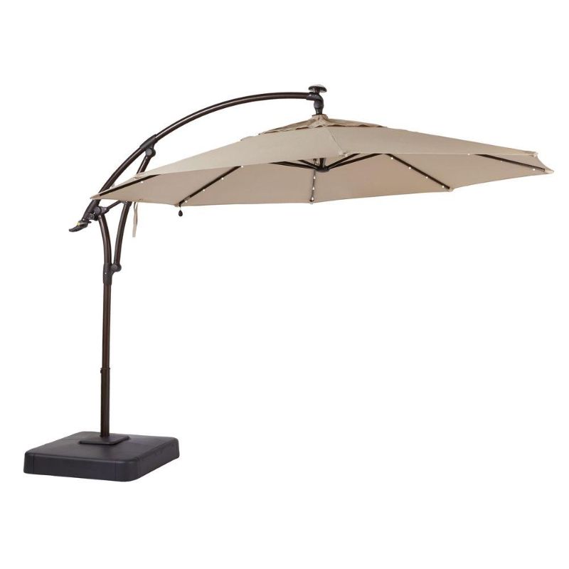 Photo 1 of 11 ft. LED Offset Patio Umbrella in Sunbrella Sand