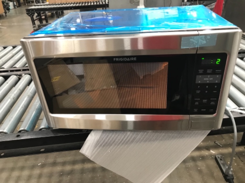 Photo 2 of Frigidaire 2.2 Cu. Ft. 1200 Watt Countertop Microwave Oven - Stainless Steel FFCE2278LS

****NOT FUNCTIONAL****
