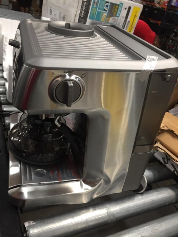 Photo 3 of Breville BES870XL Barista Expr
**DAMAGED DENTS, TURNS ON FUNCTIONS**
