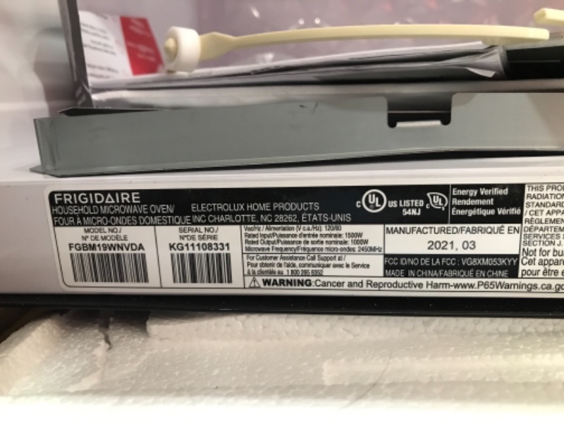 Photo 4 of FRIGIDAIRE FGBM19WNVF 30" Gallery Series Stainless Steel Over The Range Microwave with 1.9 cu. ft. Capacity 300 CFM 1000 Watts and Sensor Cooking

//MINOR DAMAGE TO DOOR HINDGE AND SOME DENTS 
