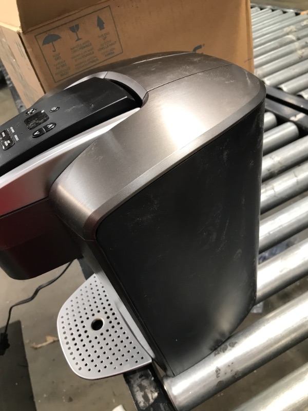 Photo 4 of Keurig K-Elite Coffee Maker, Single Serve K-Cup Pod Coffee Brewer, With Iced Coffee Capability, Brushed Slate
//MINOR COSMETIC DAMAGE, TESTED AND FUNCTIONAL
