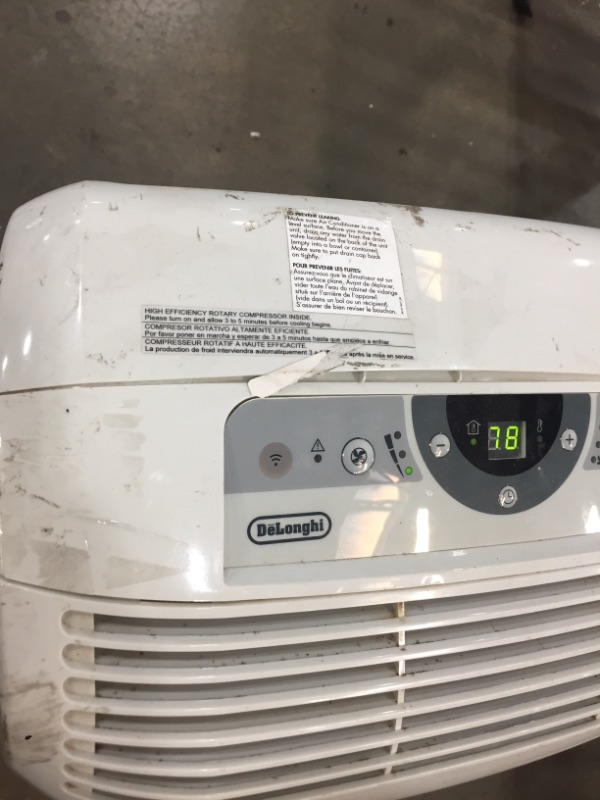 Photo 3 of De'Longhi Pinguino 6,700 BTU (11,500 BTU ASHRAE) 115-Volt Portable Air Conditioner with Remote, White, Factory Reconditioned

//TESTED AND FUNCTIONAL, MAJOR COSMETIC DAMAGE 
