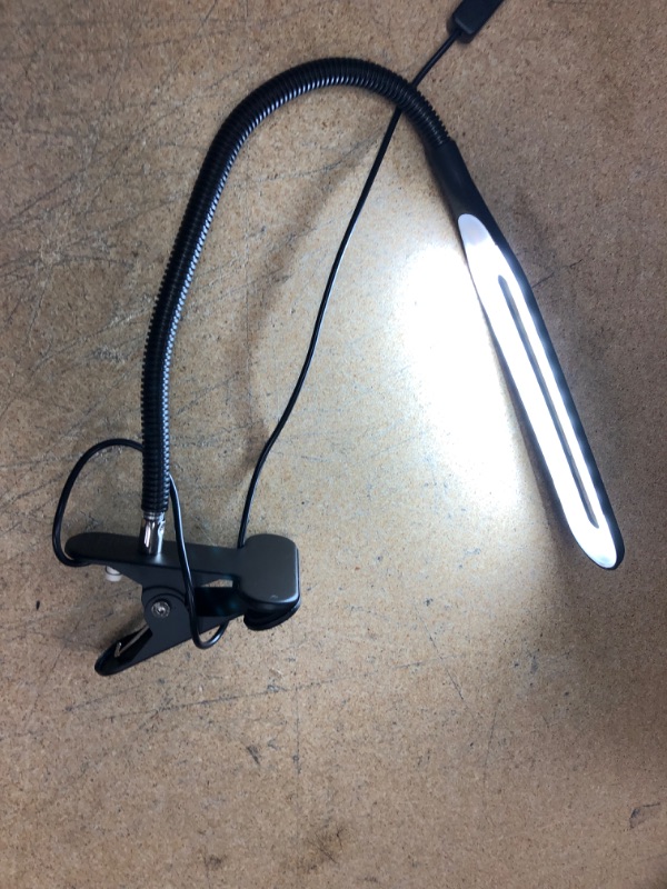 Photo 1 of DESK LAMP WITH CLAMP.