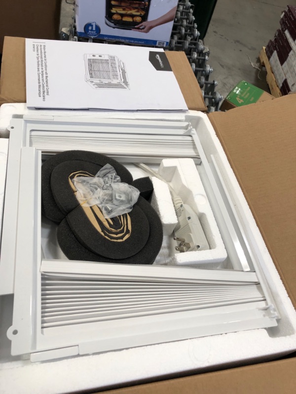 Photo 1 of Amazon Basics Window-Mounted Air Conditioner with Mechanical Control - Cools 150 Square Feet, 5000 BTU, AC Unit
