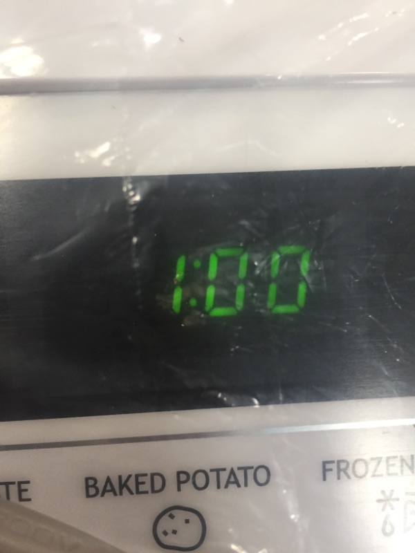 Photo 1 of Unbranded
1.6 cu. ft. Over the Range Microwave in White