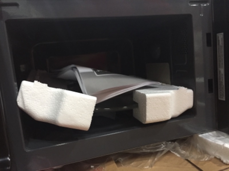 Photo 1 of Magic Chef
0.7 cu. ft. Countertop Microwave in Black with Gray Cavity