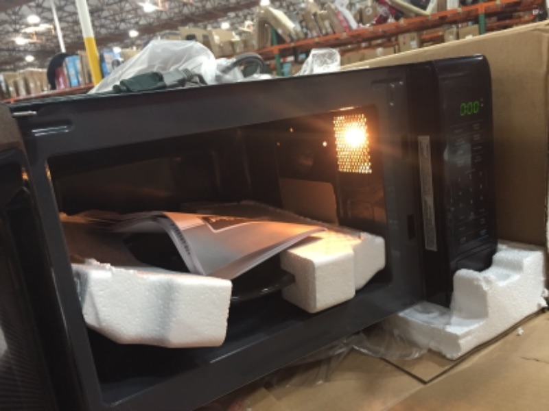 Photo 1 of Magic Chef
0.7 cu. ft. Countertop Microwave in Black with Gray Cavity