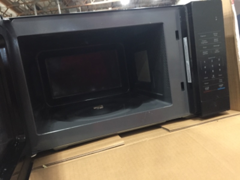 Photo 1 of Magic Chef
1.1 cu. ft. Countertop Microwave in Black with Gray Cavity