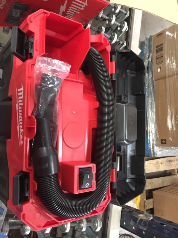 Photo 1 of Milwaukee M18 2 Gal. 18-Volt Lithium-ion Cordless Wet/Dry Vacuum (Tool-Only), 2.8 Amp Motor, Lightweight, Tool-Box Style for Effortless Transport and Storage
