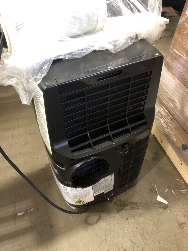 Photo 2 of Honeywell 14,000 BTU Portable Air Conditioner, Dehumidifier and Fan
