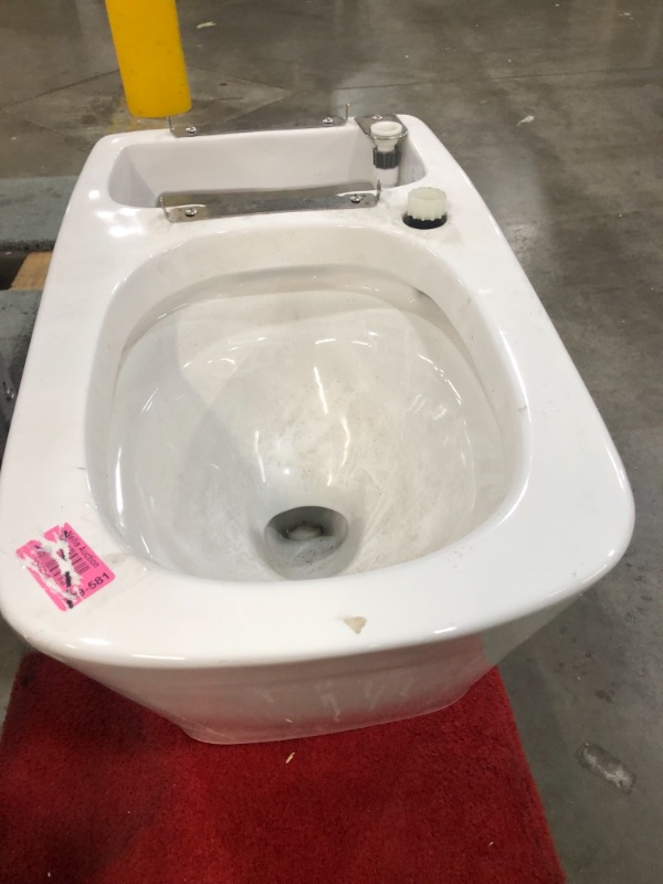 Photo 3 of ***NOT EXACT ITEM AS SEEN IN STOCK PHOTO*** PLEASE REFER TO PHOTO*** Comfort Height(R) elongated 1.28 gpf toilet with skirted trapway and Revolution 360 swirl flushing technology, White
