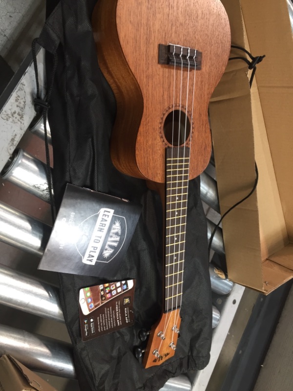 Photo 2 of 
Official Kala Learn to Play Ukulele Soprano Starter Kit, Satin Mahogany – Includes online lessons, tuner app, and booklet (KALA-LTP-S)