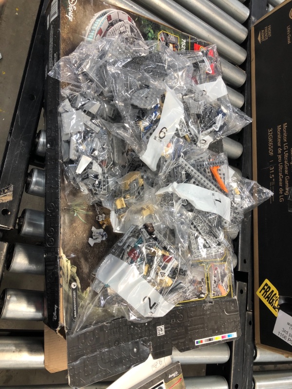 Photo 2 of LEGO Star Wars: The Rise of Skywalker Millennium Falcon 75257 Starship Model Building Kit and Minifigures (1,351 Pieces)
