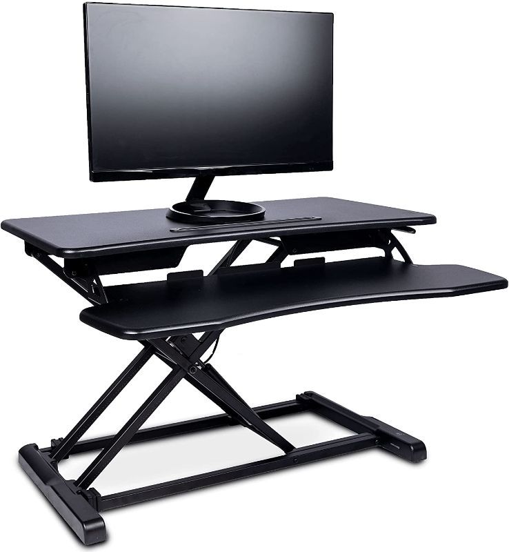 Photo 1 of TECHORBITS STANDING DESK CONVERTER - 32-INCH HEIGHT ADJUSTABLE, MDF WOOD, SIT-TO-STAND DESK RISERS FOR DUAL MONITOR WORKSTATION - HOME OFFICE ACCESSORIES - BLACK
