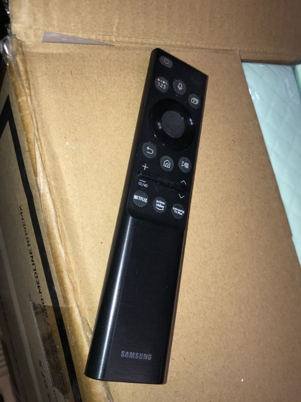 Photo 2 of Original TV BN59-01357A TV Remote Voice Solar Samsung-batteries are not included 
