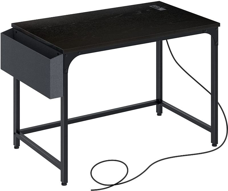 Photo 1 of Rolanstar Computer Desk with Power Outlet, Home Office PC Desk with USB Ports Charging Station, 39" Desktop Table with Side Storage Bag and Iron Hooks, Stable Metal Frame Workstation, Black 19.7"D x 39.37"W x 30.3"H

