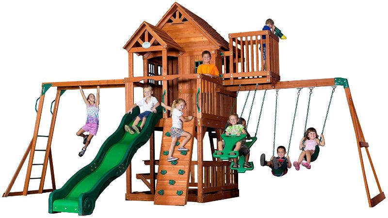 Photo 1 of **INCOMPLETE** BOX 1 OF 2)
Backyard Discovery Skyfort II All Cedar Wood Swing Set
