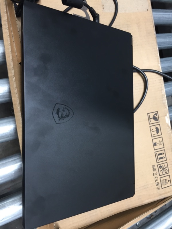 Photo 2 of PARTS ONLY
DEVICE RECEIVES POWER BUT DOES NOT TURN ON
** NOT FUNCTIONAL NEEDS PROFESSIONAL REPAIR**
MSI GS Series GS66 Stealth 10SF-683 15.6" 240 Hz Intel Core i7 10th Gen 10750H 
