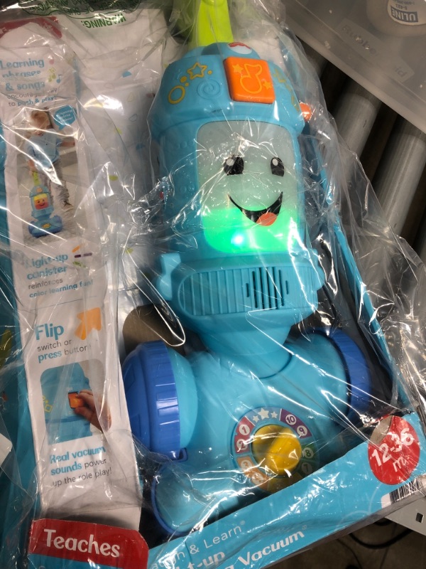 Photo 2 of Fisher-Price Laugh & Learn Light-up Learning Vacuum Musical Push Toy