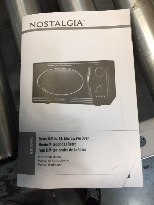 Photo 6 of  Nostalgia RMO4RR Retro Large 0.9 cu ft, 800-Watt Countertop Microwave Oven, 12 Pre-Programmed Cooking Settings, Digital Clock, Easy Clean Interior, Metallic Red
//tested power on //back is dented 