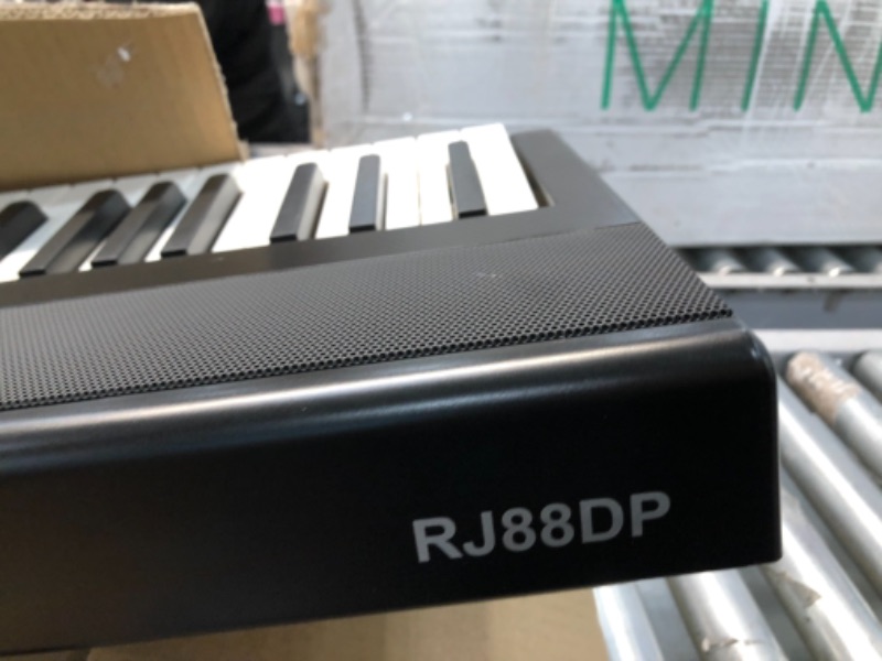 Photo 3 of RockJam 88-Key Beginner Digital Piano with Full-Size Semi-Weighted Keys, Power Supply, Simply Piano App Content & Key Note Stickers