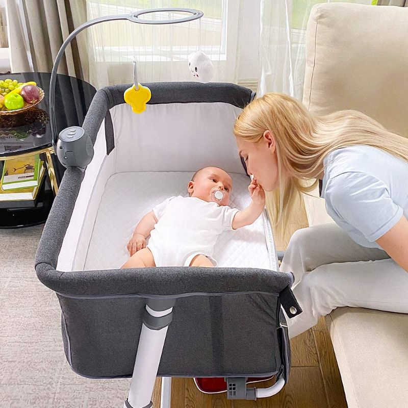 Photo 1 of 
Baby Bedside Bassinet, RONBEI Bedside Crib, Babies Bed to Bed Sleeper for Infant, Boys, Girls, Newborn, Height Adjustable Portable Bassinet (Music Box)
Color:Gray-with Wheels