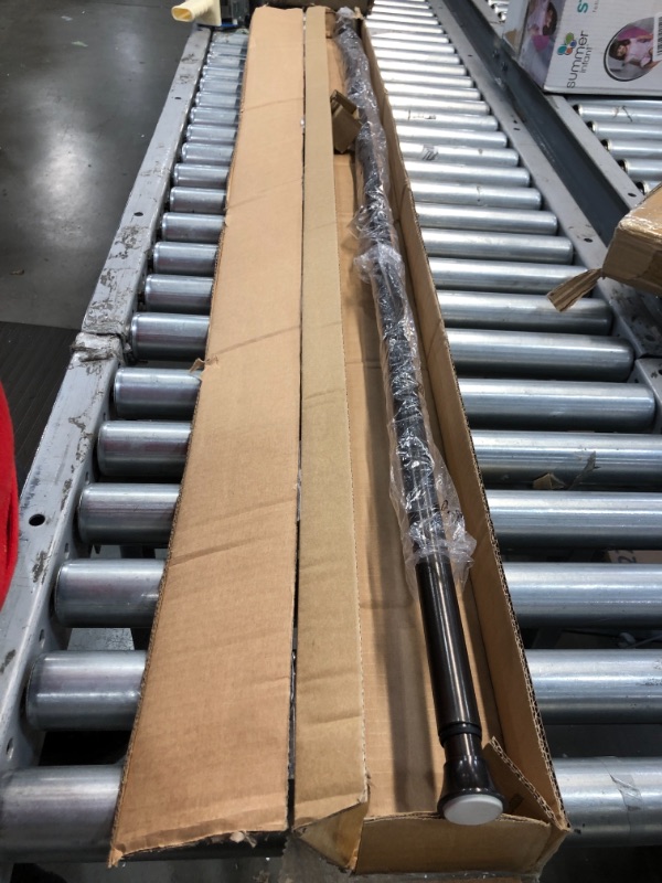 Photo 1 of Amazon Basics Tension Curtain Rod 62IN-116IN