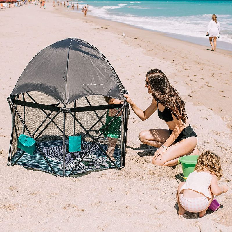 Photo 1 of Baby Delight Go With Me Eclipse Portable Playard (Canopy Included) DIMENSIONS: 49" wide x 28" wide with no canopy / 49" wide x 49" tall with canopy
