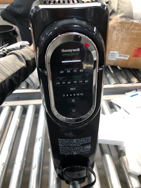 Photo 2 of Honeywell HZ-789 EnergySmart Electric Oil Filled Radiator Whole Room Heater, Black, 24.45"H x 9.06"D x 13.74"W (HZ789)
