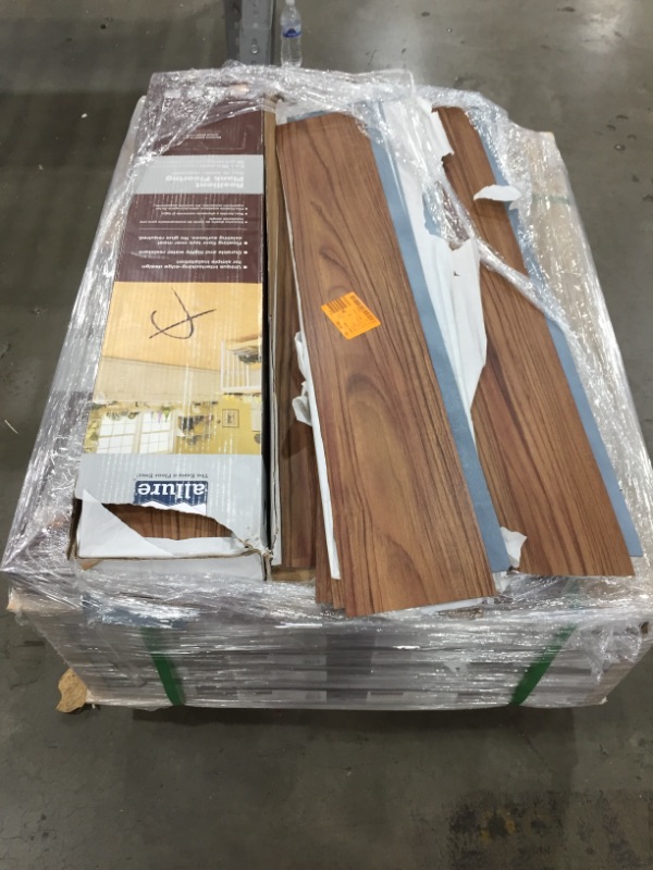 Photo 1 of 25 CASES TrafficMaster Teak 6 in. W x 36 in. L Luxury Vinyl Plank Flooring (24 sq. ft. / case)
