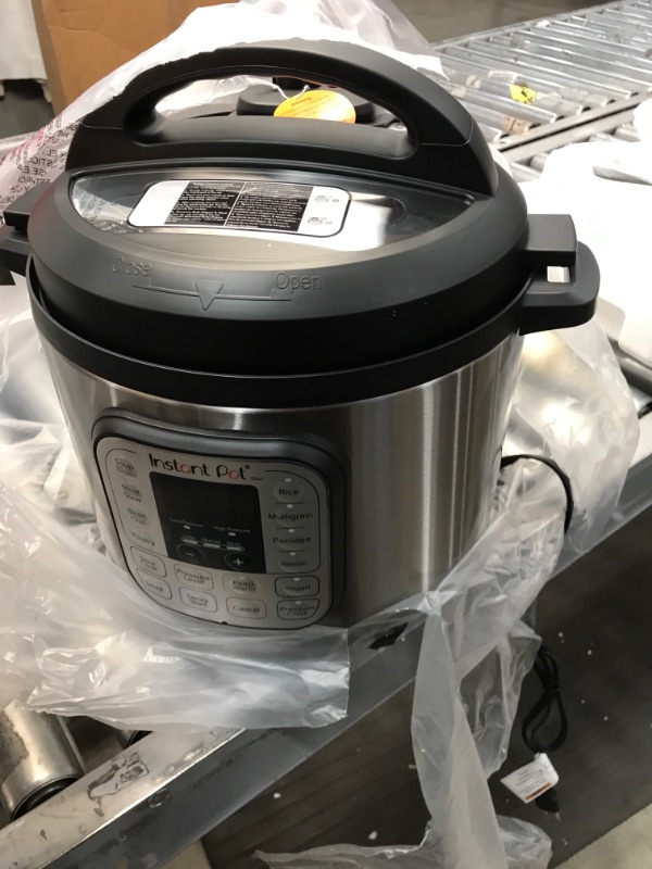 Photo 1 of Instant Pot Duo 7-in-1 Electric Pressure Cooker, Slow Cooker, Rice Cooker, Steamer, Sauté, Yogurt Maker, Warmer & Sterilizer, 8 Quart, Stainless Steel/Black
