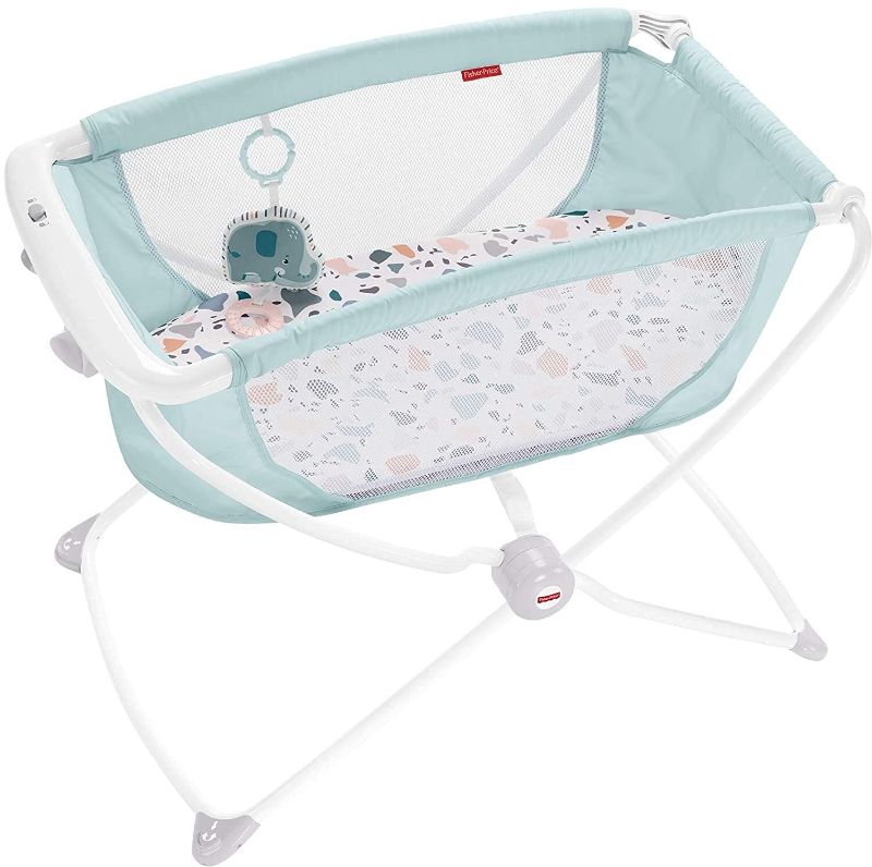 Photo 1 of Fisher-Price Rock with Me Bassinet Pacific Pebble, Portable Bassinet with Rocking Motion and Soothing Features for Newborns and Infants
