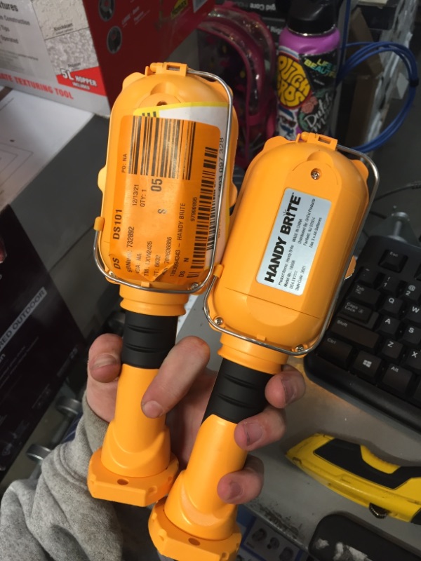 Photo 1 of Ultra-Bright LED 8.35 in. Yellow Cordless Work Light Lamp
2 PACK 
AS IS USED, MINOR DAMAGE PLEASE SEE PHOTOS 
