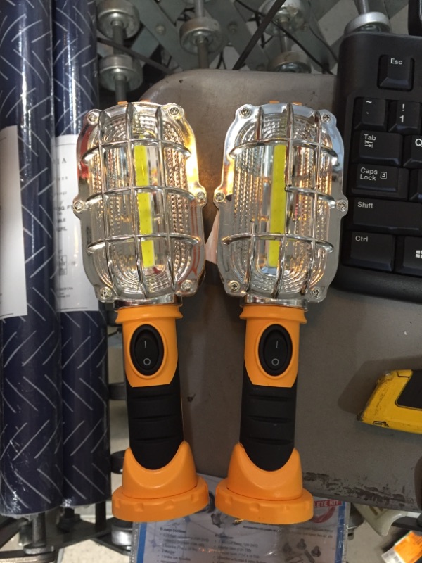 Photo 1 of Ultra-Bright LED 8.35 in. Yellow Cordless Work Light Lamp
2 PACK 
AS IS USED, MINOR DAMAGE PLEASE SEE PHOTOS 