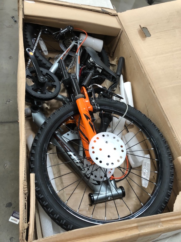 Photo 2 of *SEE last picture for damage* 
Huffy Valcon 20" Mountain Bike for Boys - 6 Speed - Dual Suspension - Silver & Orange
