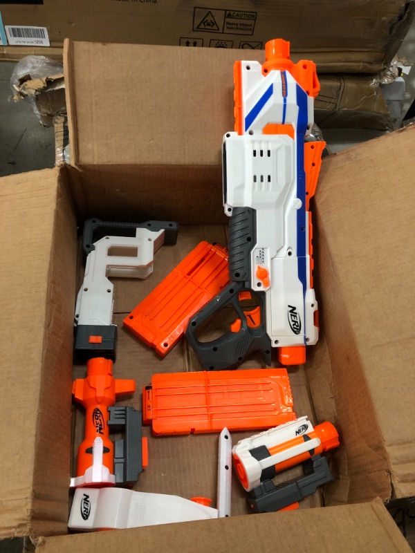 Photo 2 of *USED*
*MISSING darts, batteries NOT included* 
NERF Modulus Regulator Toy