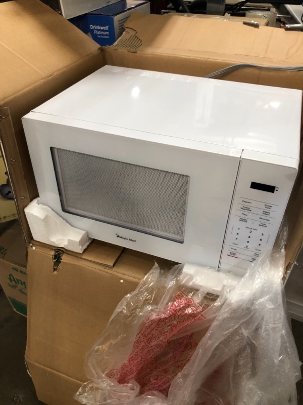 Photo 2 of *selling FOR PARTS, NO returns* 
Magic Chef 1.1 Cu. Ft. Countertop Microwave in White
