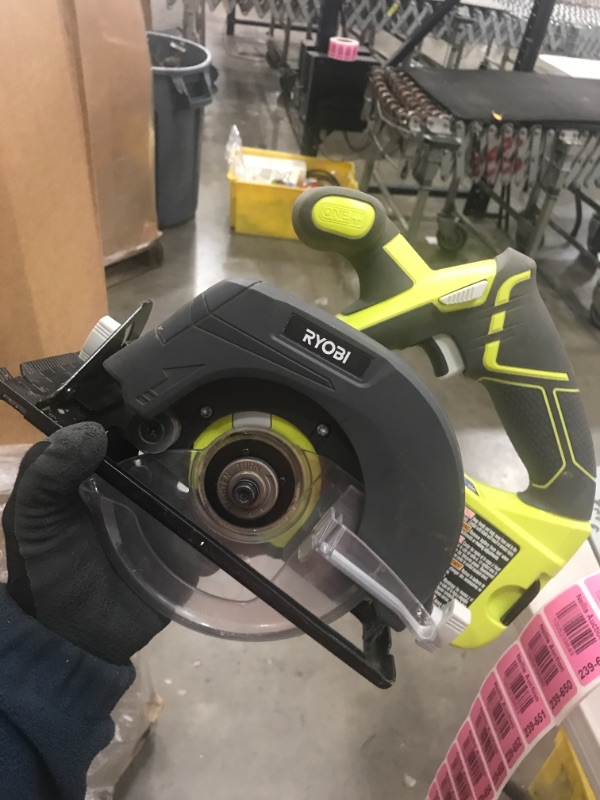 Photo 2 of *USED*
*MISSING blades, battery and charger* 
RYOBI ONE+ 18V Cordless 5-1/2 in. Circular Saw with (1) 4.0 Ah Lithium-Ion Battery and 18V Charger