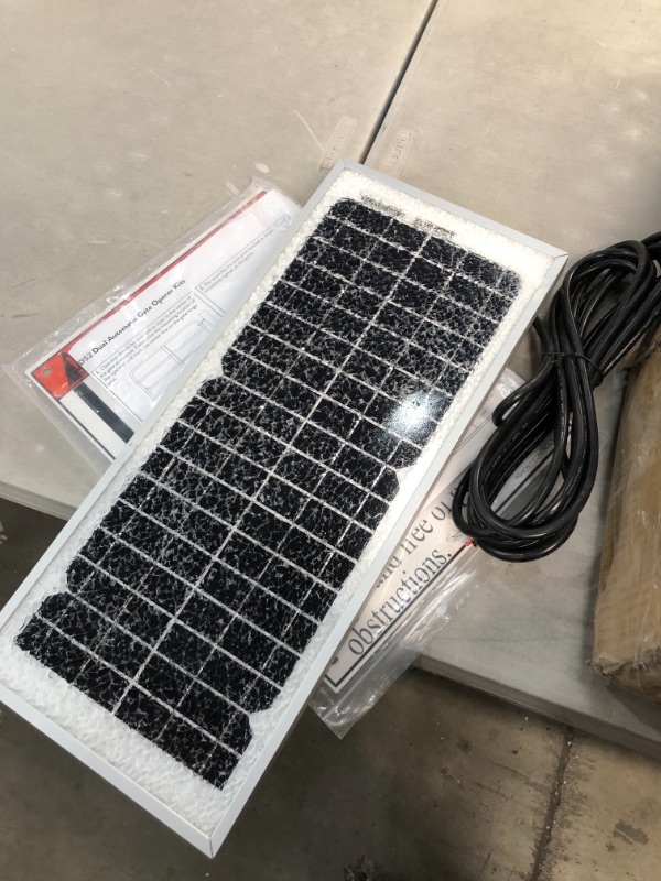 Photo 3 of *solar panel DAMAGED/ SHATTERED, SEE pictures*
Ghost Controls TDS2 Heavy-Duty Dual Automatic Gate Opener Kit for Swing Gates Up to 20 Feet

