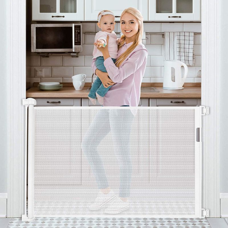 Photo 1 of BETERTEK Retractable Baby Gate 54” Tough Durable Mesh Outdoor Retractable Gate Indoor Safety Mesh Baby Gates, Pet Dog Gate
