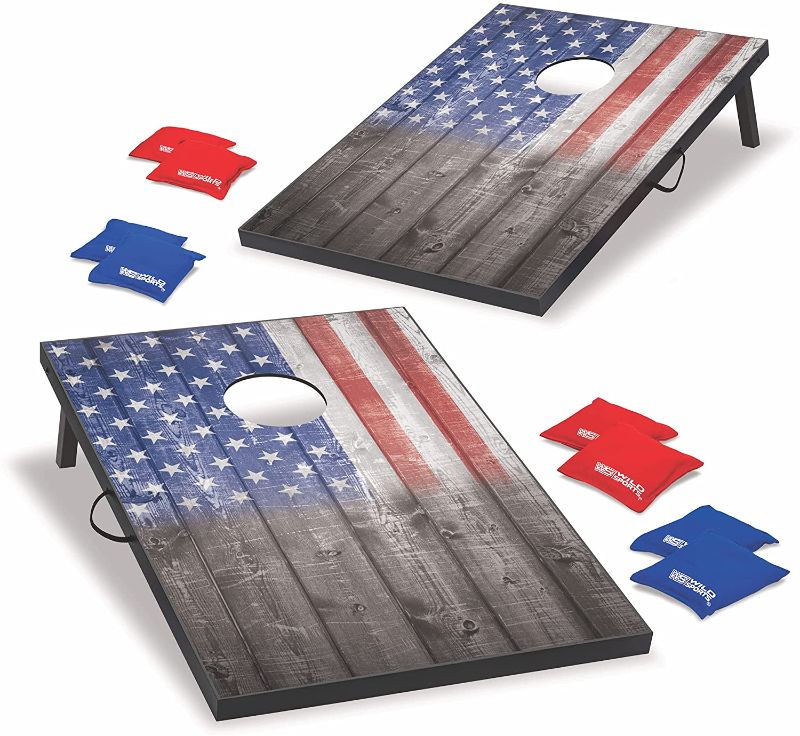 Photo 1 of *SEE last picture for damage* 
Wild Sports 2’x3’ Cornhole Outdoor Game Set, USA Flag MDF Wood with all-weather bean bags included – perfect for Backyard, Beach, Park, and Tailgates
