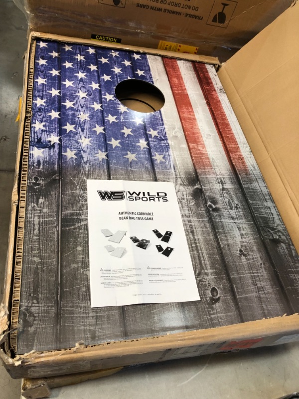 Photo 2 of *SEE last picture for damage* 
Wild Sports 2’x3’ Cornhole Outdoor Game Set, USA Flag MDF Wood with all-weather bean bags included – perfect for Backyard, Beach, Park, and Tailgates

