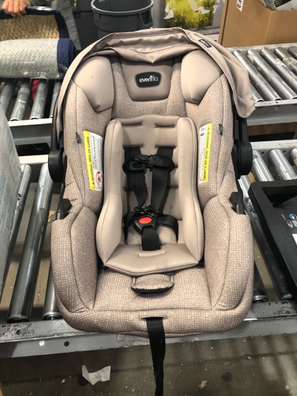 Photo 1 of Evenflo Pivot Modular Travel System with SafeMax Infant Car Seat - Sandstone
***NEEDS TO BE CLEANED**MISSING FRONT BAR ON STROLLER**