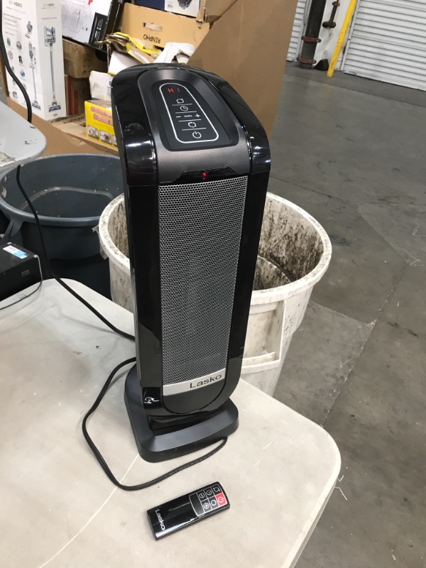 Photo 2 of Lasko Tower 22 in. Electric Ceramic Oscillating Space Heater with Digital Display and Remote Control  TESTED AND FUNCTIONS