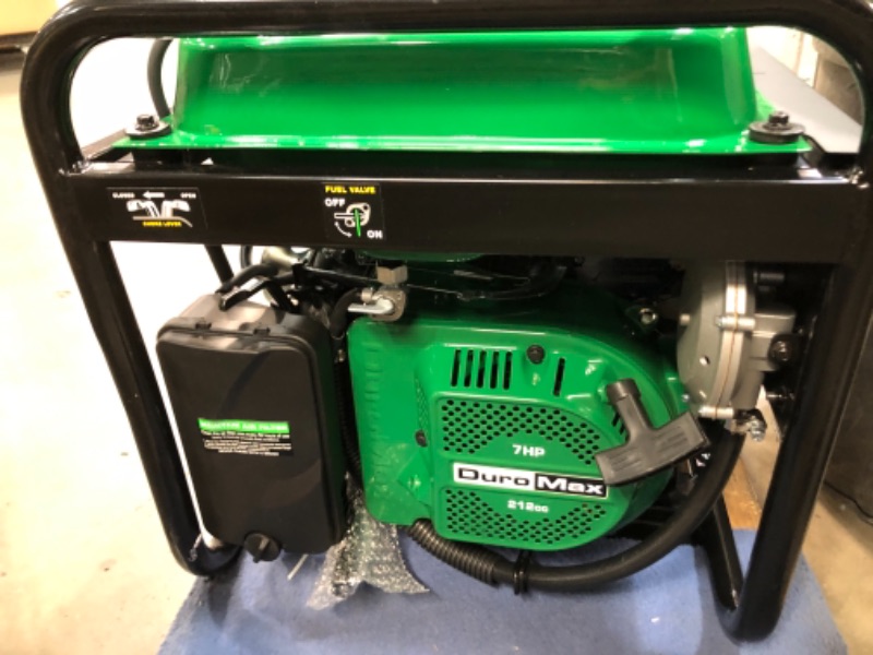 Photo 1 of DuroMax XP4850EH Generator-4850 Watt Gas or Propane Powered-Electric Start-Camping & RV Ready, 50 State Approved Dual Fuel Portable Generator, Green