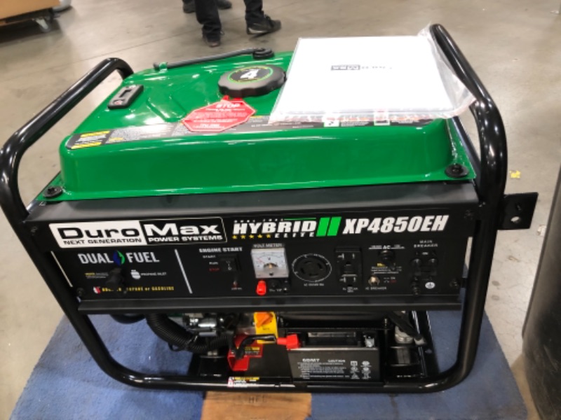 Photo 1 of DuroMax XP4850EH Generator-4850 Watt Gas or Propane Powered-Electric Start-Camping & RV Ready, 50 State Approved Dual Fuel Portable Generator, Green